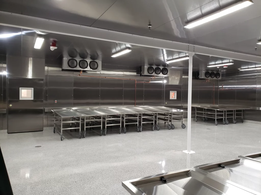 Walk-in-refrigeration-overview-with-cadaver-carts-against-the-wall